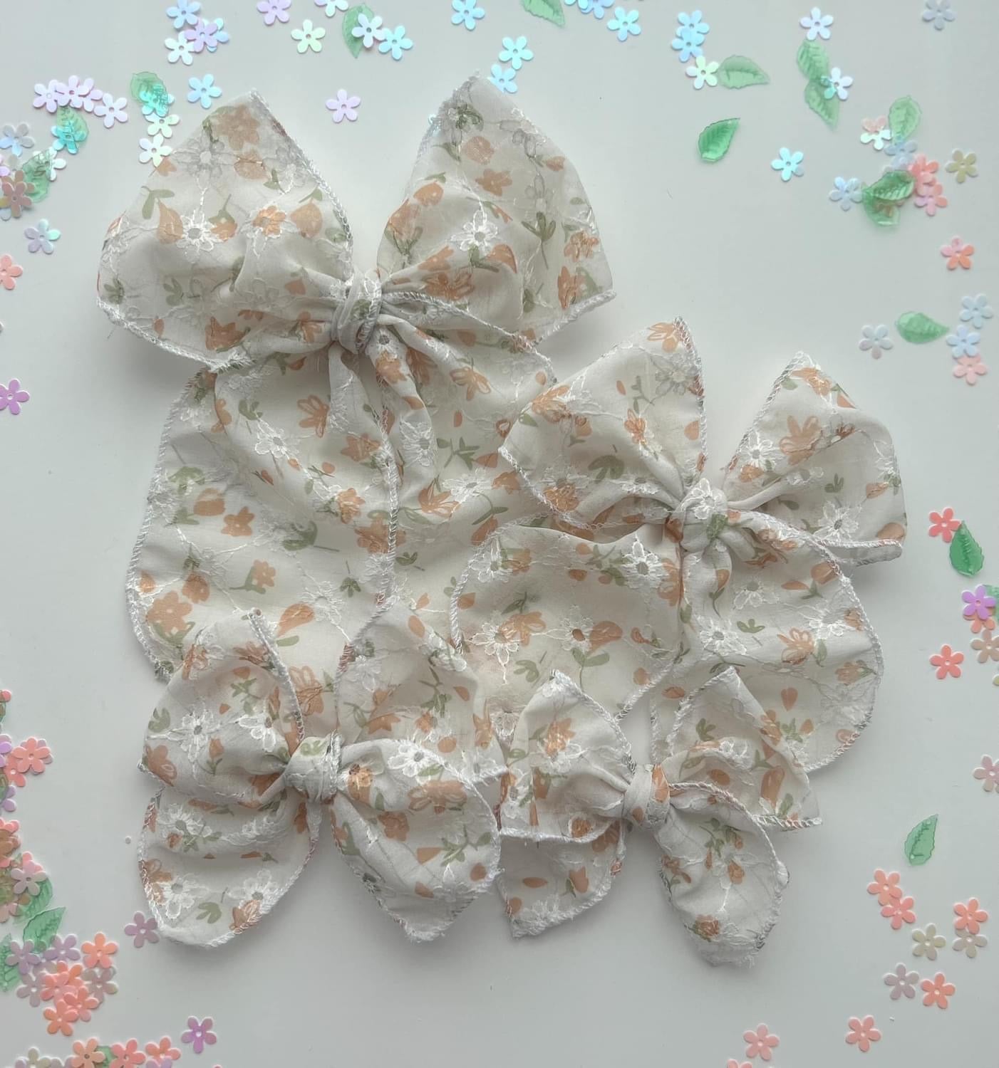 EMBROIDERED FLORAL CHIFFON BOW