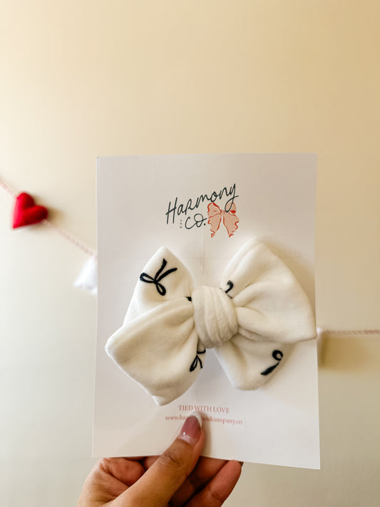 Black Dainty Bows Pinwheel Bow